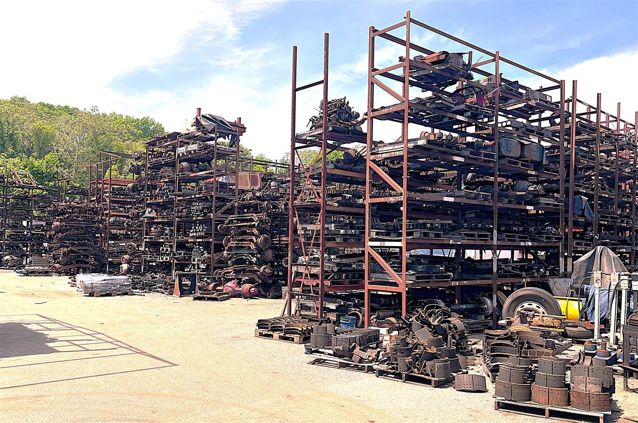 Pile of obsolete brake shoes and drums in Palmer Spring Company's salvage yard