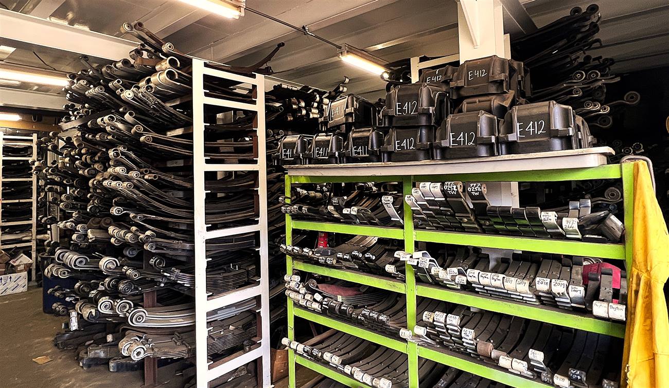 Organized indoor shelving of new heavy-duty truck parts